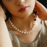 Smooth Mother of Pearls and Silver Shell Beaded OT Necklace