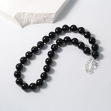 Knotted 12mm Black Onyx Beaded Necklace