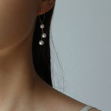 Graceful Gold Wire Pearl Earrings