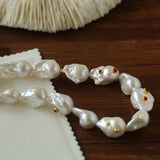 Large Baroque Colored Diamond Pearl Necklace