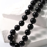 Knotted 12mm Black Onyx Beaded Necklace