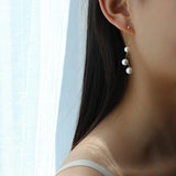 Graceful Gold Wire Pearl Earrings