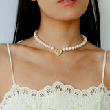 Boho Chic Pearl Necklace with Vintage Heart Pendant – Soft Glow Elegance - floysun
