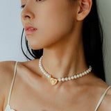 Boho Chic Pearl Necklace with Vintage Heart Pendant – Soft Glow Elegance - floysun