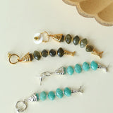 Moonlight Swimming Fish Earrings – Sparkling Stone / Aquamarine - floysun