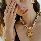 Sunrise Bloom Necklace – Woven Cord & Hammered Gold Sun Pendant - floysun