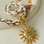 Sunrise Bloom Necklace – Woven Cord & Hammered Gold Sun Pendant - floysun
