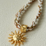 Sunrise Bloom Necklace – Woven Cord & Hammered Gold Sun Pendant - floysun