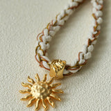 Sunrise Bloom Necklace – Woven Cord & Hammered Gold Sun Pendant - floysun