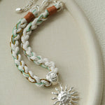 Sunrise Bloom Necklace – Woven Cord & Hammered Silver Sun Pendant - floysun