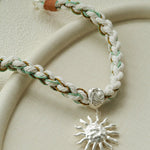 Sunrise Bloom Necklace – Woven Cord & Hammered Silver Sun Pendant - floysun