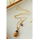 Collier pendentif gourde avec œil de tigre ou agate rouge ajustable