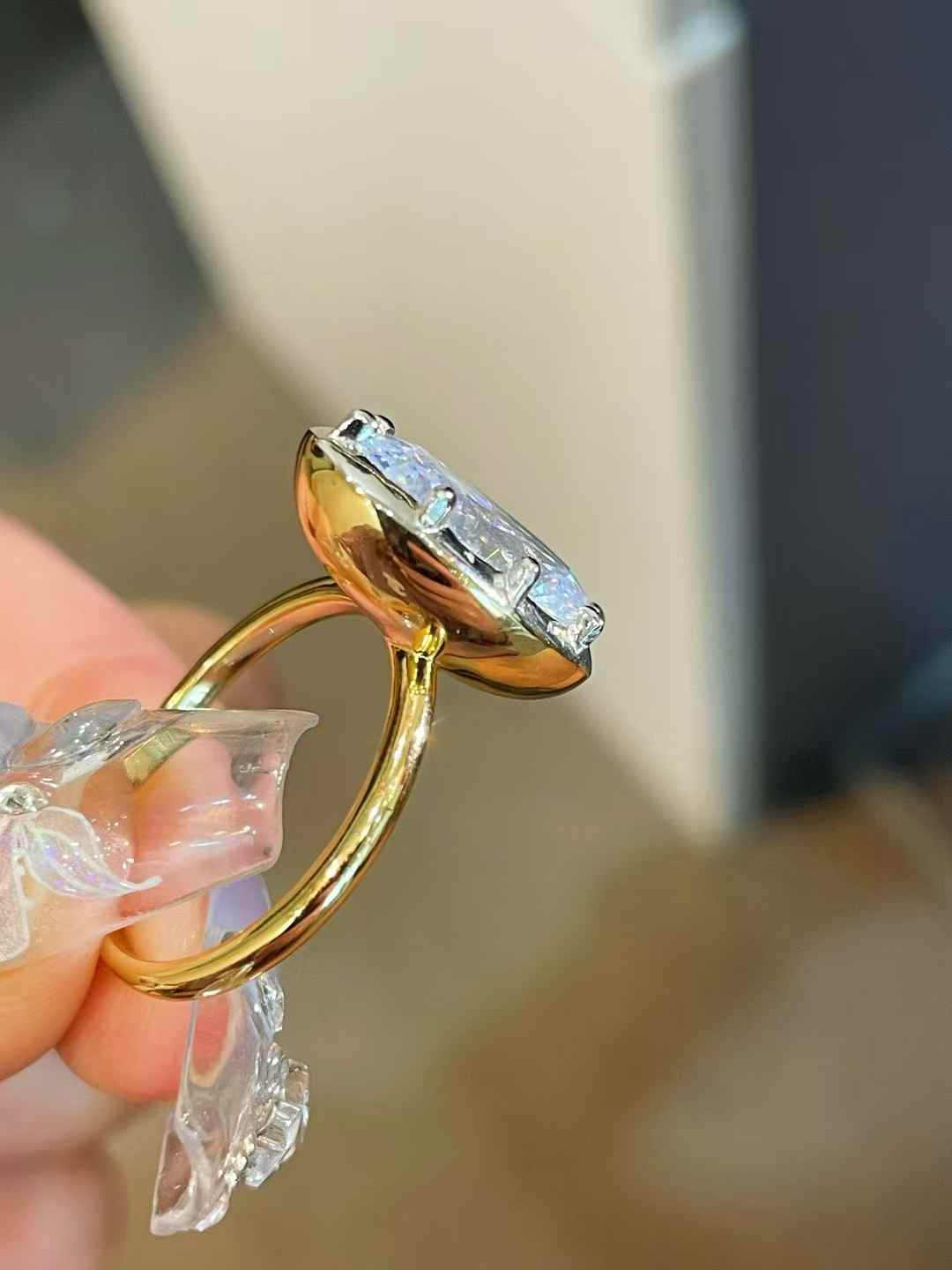 Oversized oval diamond simulant solitaire ring in 18K gold vermeil and sterling silver