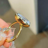 Oversized oval diamond simulant solitaire ring in 18K gold vermeil and sterling silver