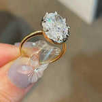 Oversized oval diamond simulant solitaire ring in 18K gold vermeil and sterling silver