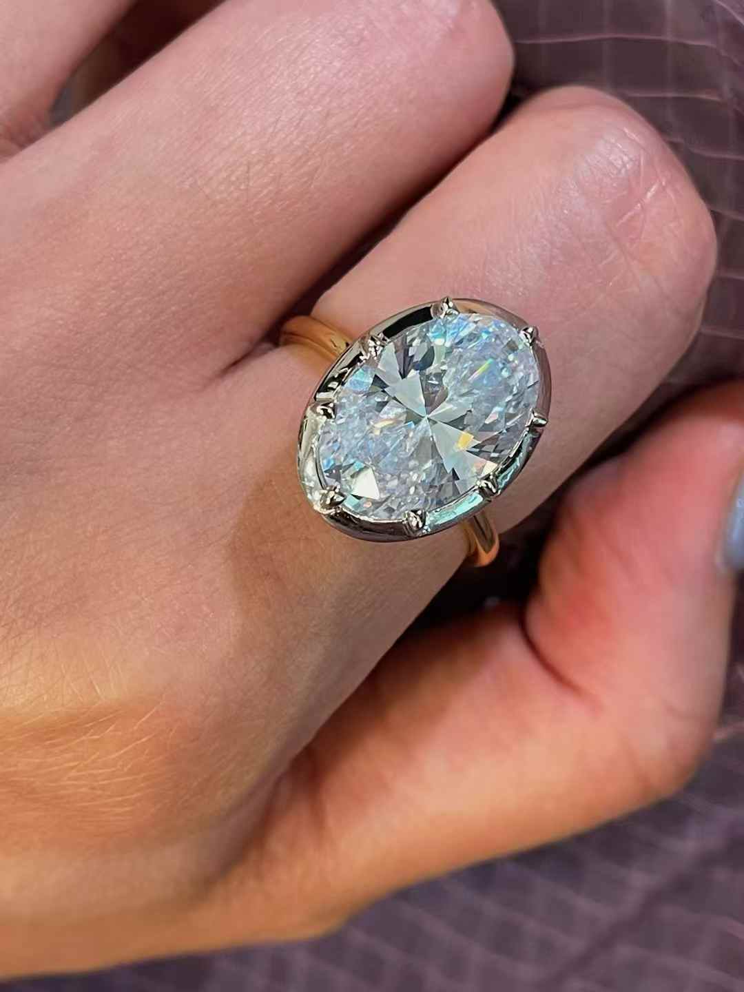 Oversized oval diamond simulant solitaire ring in 18K gold vermeil and sterling silver