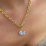 Oval diamond simulant pendant in 18K gold vermeil and sterling silver; pendant only