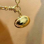 Oval diamond simulant pendant in 18K gold vermeil and sterling silver; pendant only