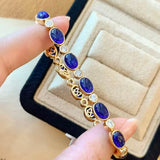 Vintage-Inspired Oval Synthetic Sapphire Tennis Bracelet