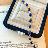 Vintage-Inspired Oval Synthetic Sapphire Tennis Bracelet