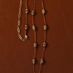 Full view of labradorite and garnet cord necklace