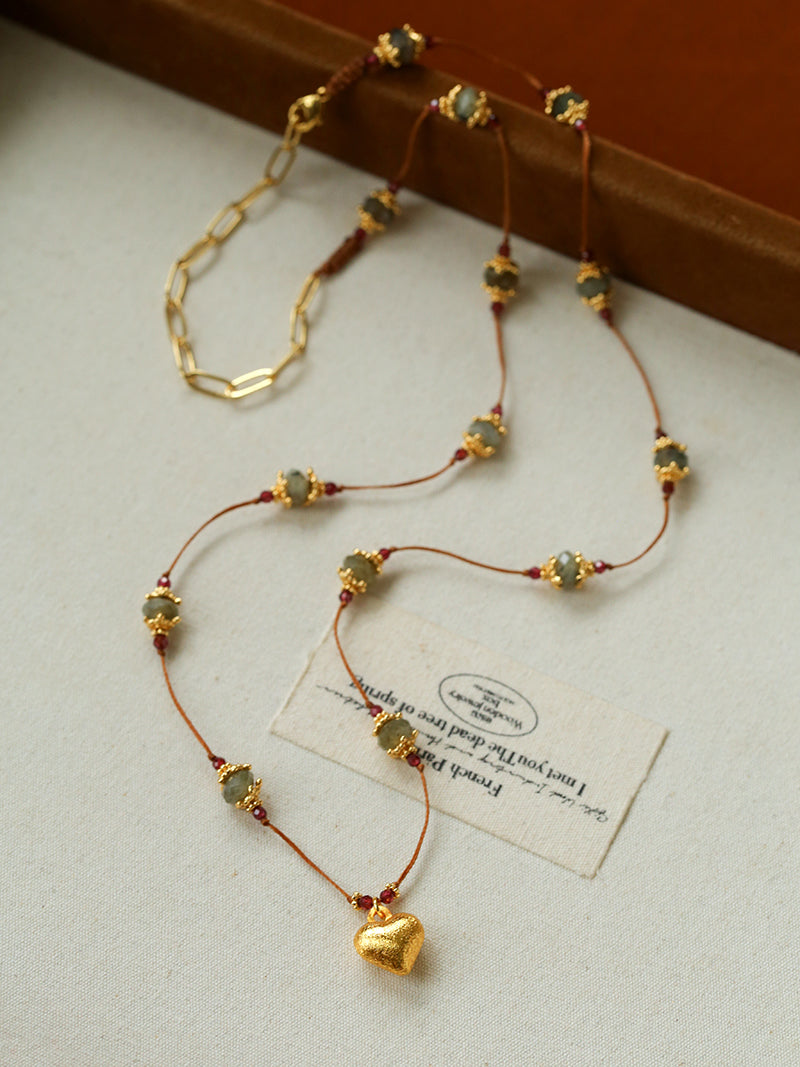 Heart pendant necklace on a jewellery display card