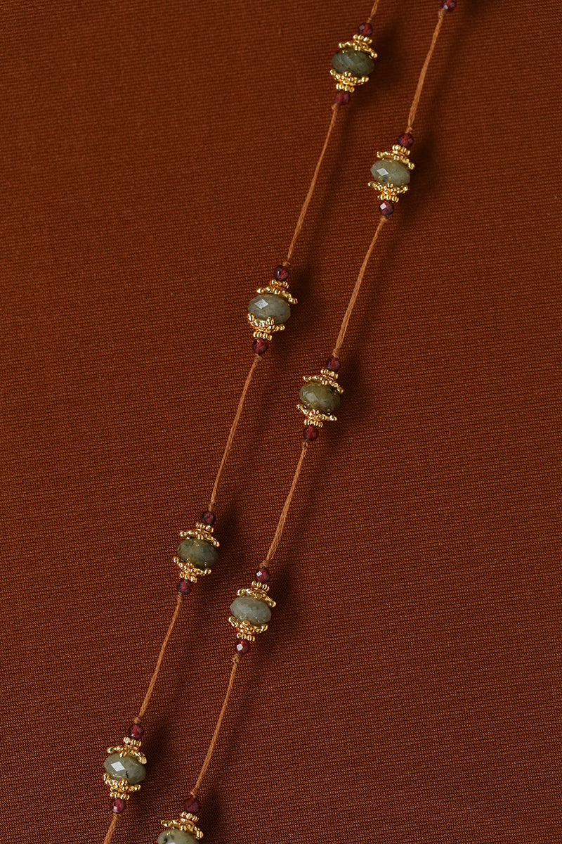 Faceted labradorite stations with gold-tone details
