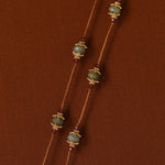 Faceted labradorite stations with gold-tone details
