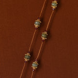 Faceted labradorite stations with gold-tone details