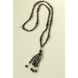 Collana lunga con nappina in ossidiana e cristallo bianco