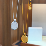 Four-leaf clover enamel pendant necklaces - back view