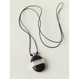 Collier flasque en bois de santal Esprit Nomade  