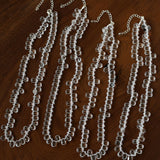 Collana choker con perline di vetro a goccia annodate a mano