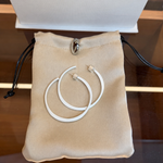 Sculptural white C-hoop statement earrings in 925 sterling silver