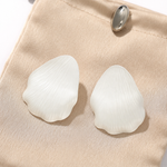 Sculpted white petal statement stud earrings in 925 sterling silver