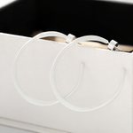 Sculptural white C-hoop statement earrings in 925 sterling silver