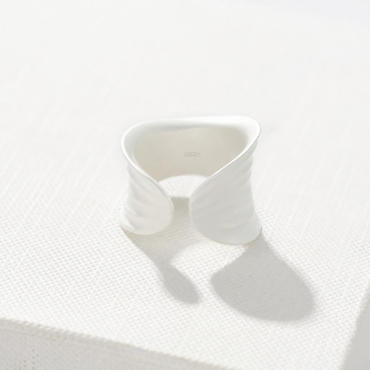 Sculptural white ripple adjustable open ring in 925 sterling silver