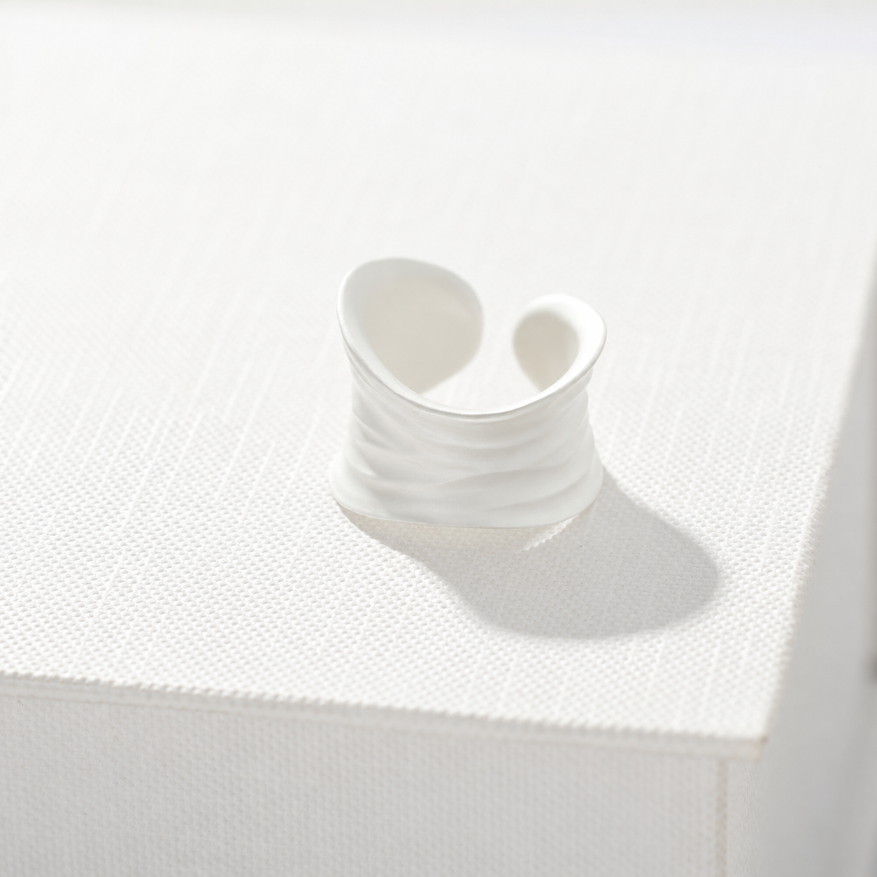Sculptural white ripple adjustable open ring in 925 sterling silver