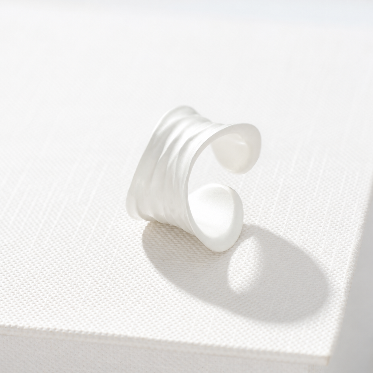 Sculptural white ripple adjustable open ring in 925 sterling silver