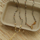 Hand‑Strung Micro‑Bead Hammered Slender Bar Pendant Necklace