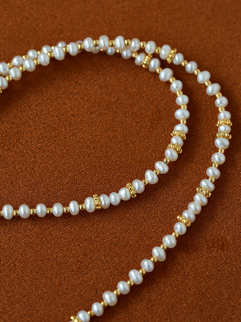 Freshwater pearl beads with gold-tone spacers