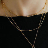 Effervescent Elegance: Singular Beaded Chain Necklace