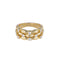 Scattered cubic zirconia ribbon statement ring on white background