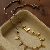 Vintage Leaf Multi‑Charm Pyrite Hand‑Strung Necklace