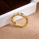 Sculpted ribbon wrap band ring - front view