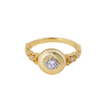 Brushed starburst cubic zirconia ring on white background