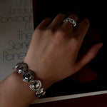 Silver oval dome bracelet styled with a ring