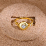 Brushed medallion statement ring - front view