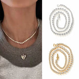 Graduated CZ tennis necklace styled with a grey top