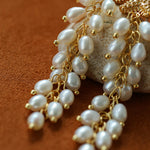 Close-up of freshwater pearl strands beneath a starfish stud